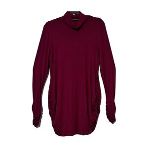 Turtleneck Neck with rouching on the sleeves and down the sides NWOT